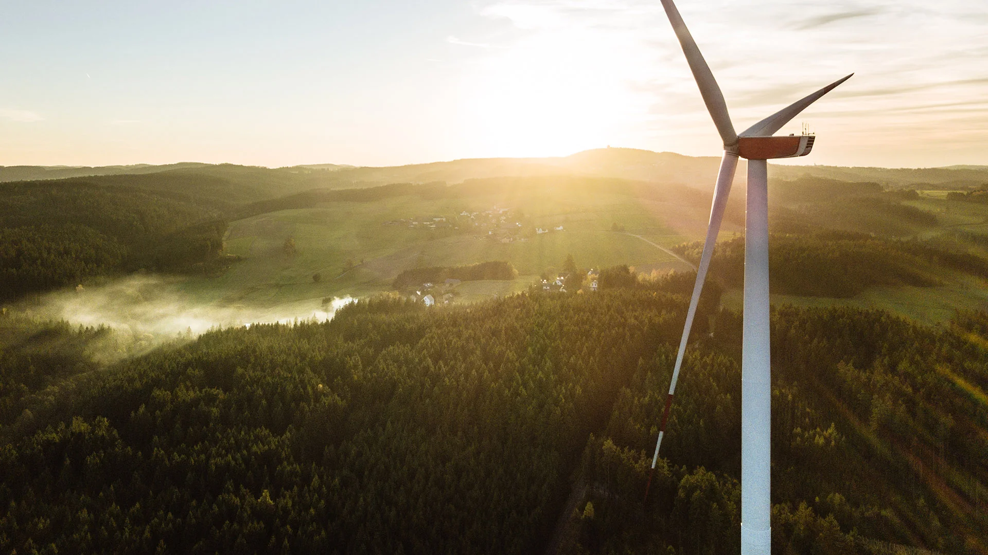Wind Turbine in the sunset seen from an aerial view