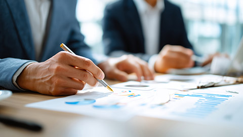 Meeting With Business Advisor And Investment Consultant In The Meeting Room To Analyze And Discuss Financial Report Situation.