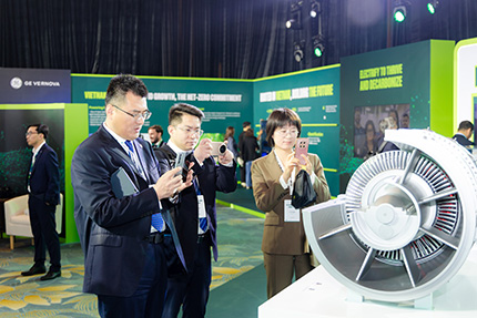 People taking pictures at conference