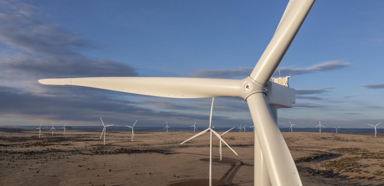 Several wind turbines in a large field
