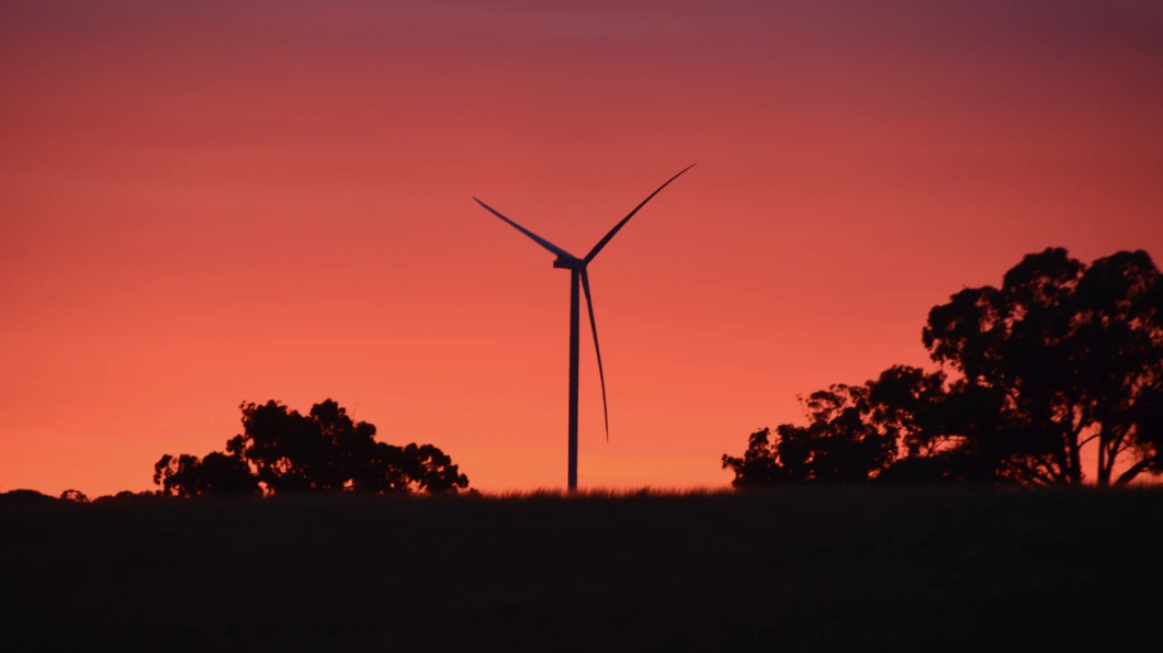The silhouette of a 6-MW workhorse wind turbine in Australia.