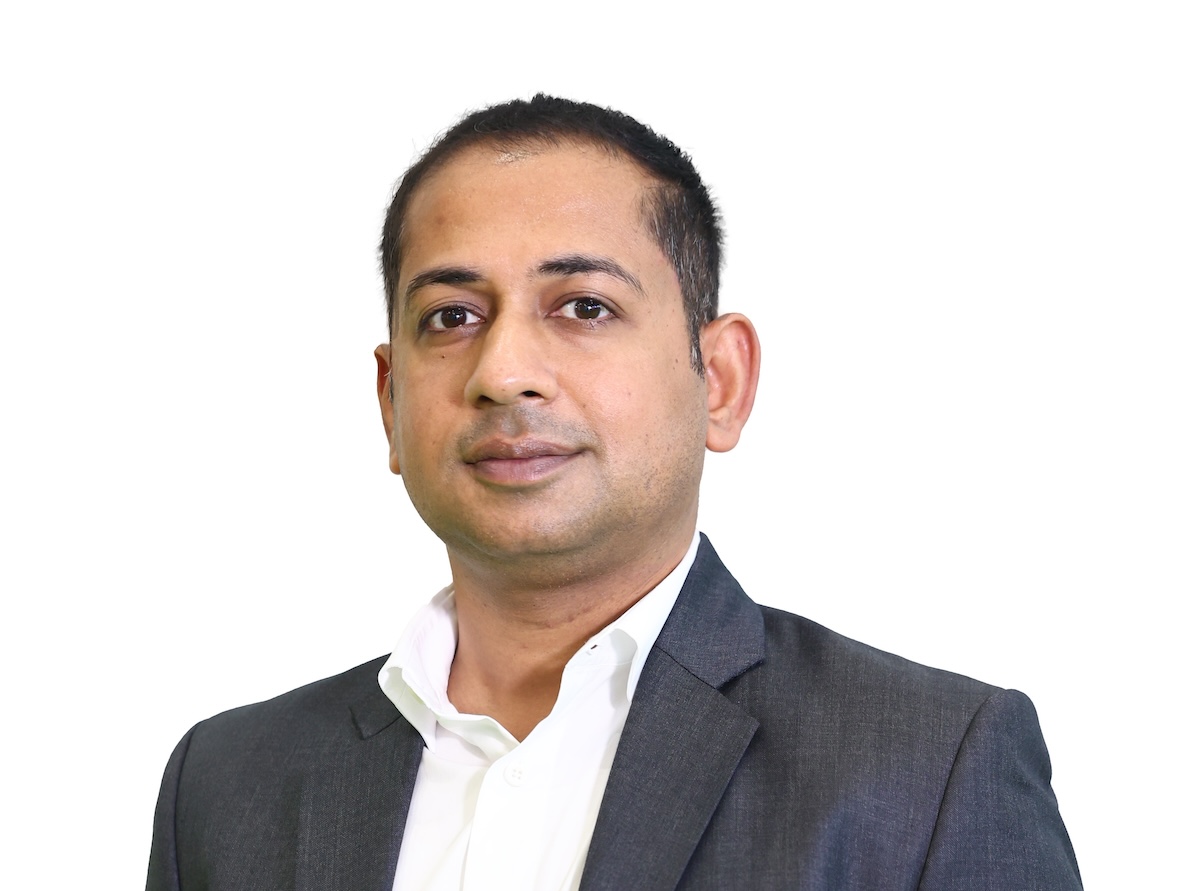 Indian man in a suit on a white background