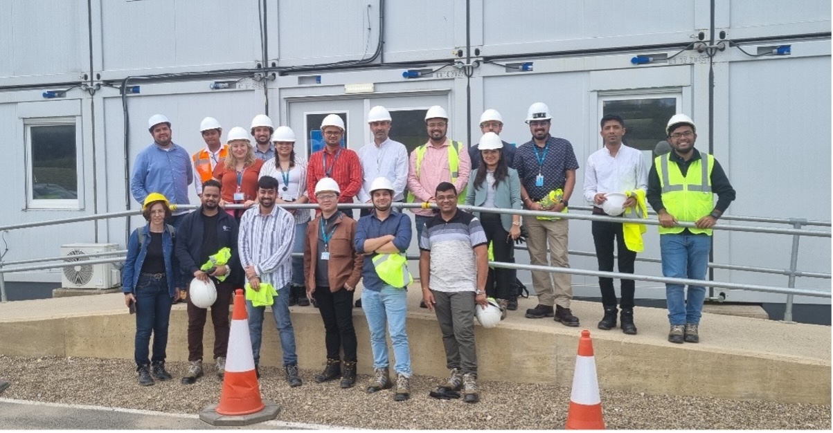 Nikhil Sharma (front row, far right) participating in a site visit as part of his learning journey.