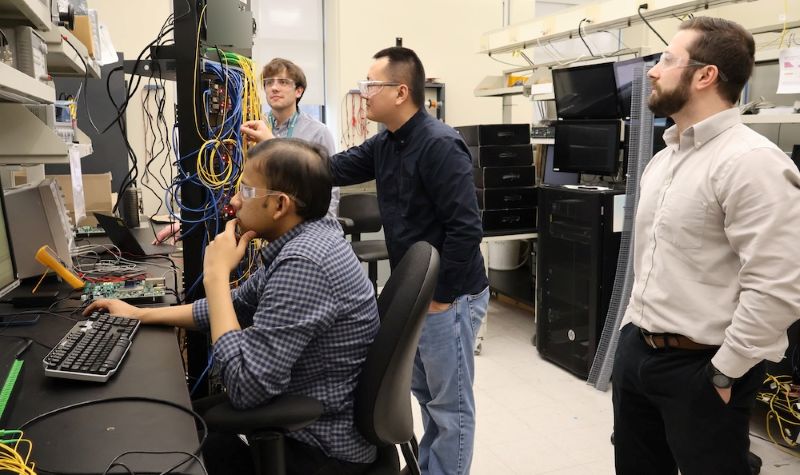 Team looking at computers