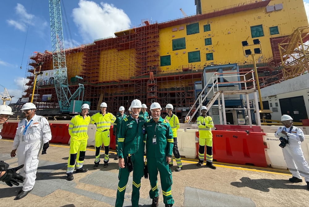 GE Vernova Chief Corporate Officer Roger Martella and Chief People Officer Steven Baert at the Singapore Services facility.