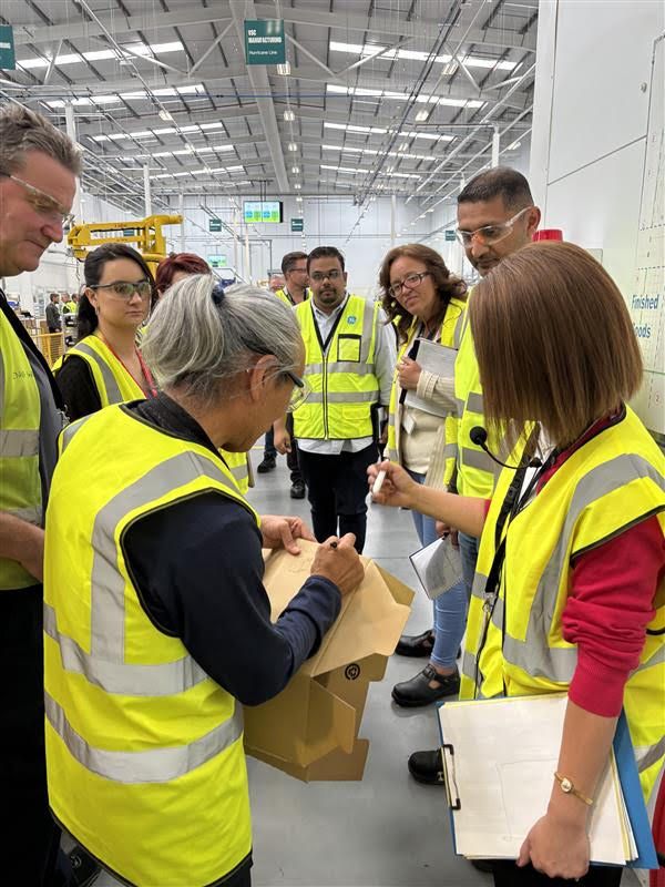 Group in bright yellow vests
