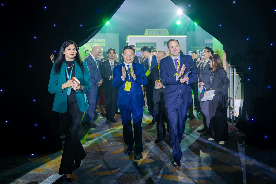 Group of people walking onstage