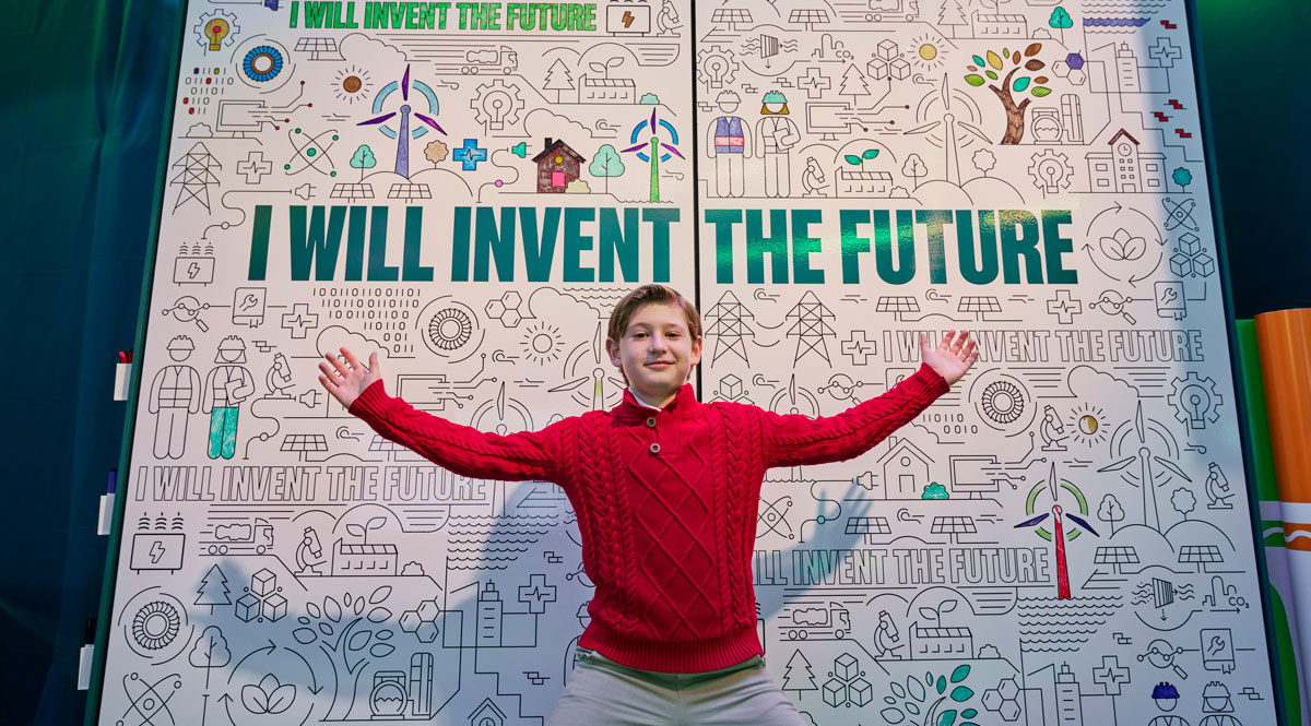 Kid posing in front of Backdrop