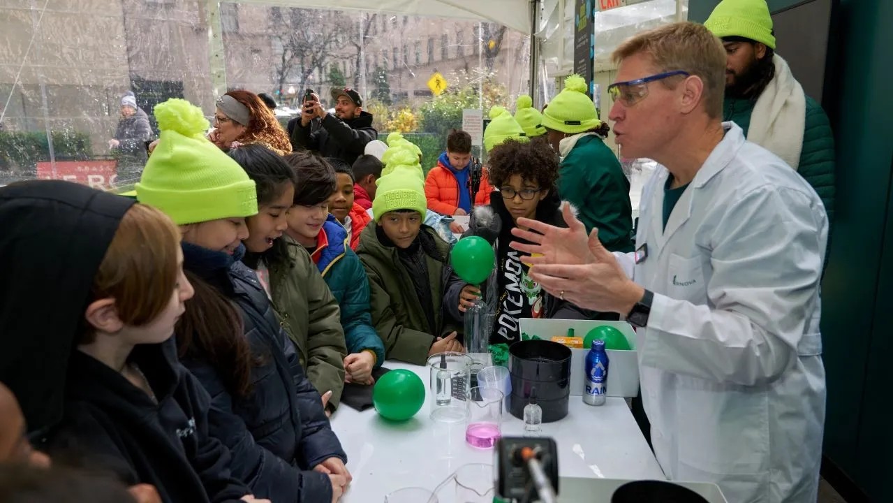 People inspecting parts