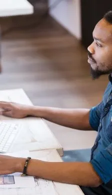 guy sitting at laptop